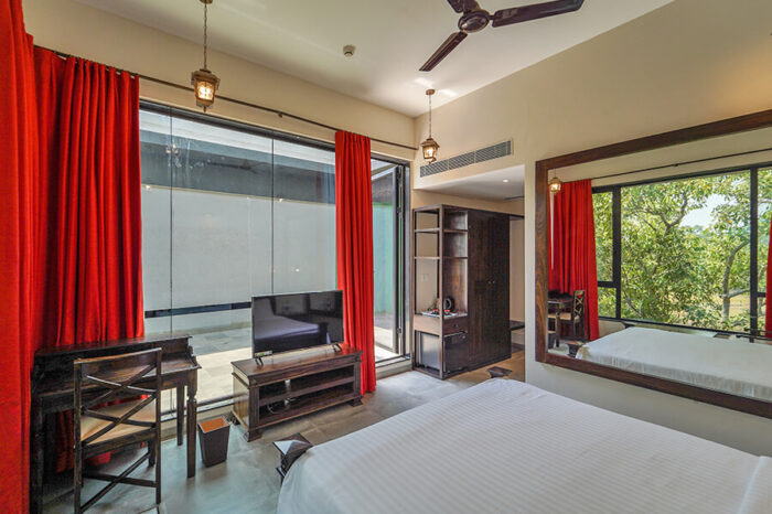 Luxury king room in Lonavala hotels with swimming pool offering premium comfort for relaxing weekend getaways near Mumbai