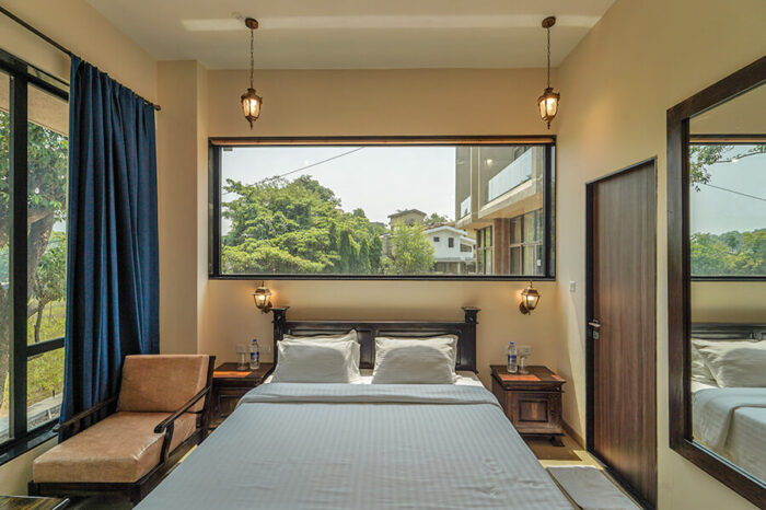 Premium room in Lonavala at a couple friendly hotel with modern interiors, perfect for weekend getaways near Mumbai