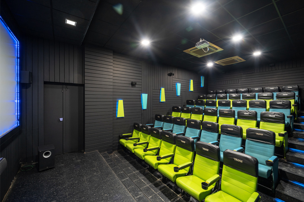 In-house multiplex at a couple friendly hotel in Lonavala offering entertainment experience during weekend getaways near Mumbai